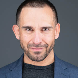 Male Professional in a Blue Jacket